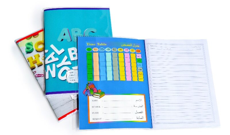 Close-up of a custom full-color cover and lay-flat binding on a Colorfly exercise book