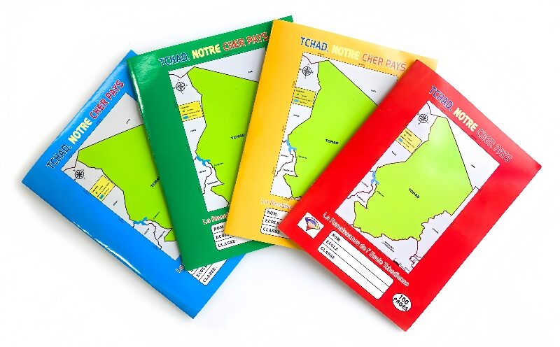 A team using custom Colorfly exercise books with full-color brand covers in a meeting