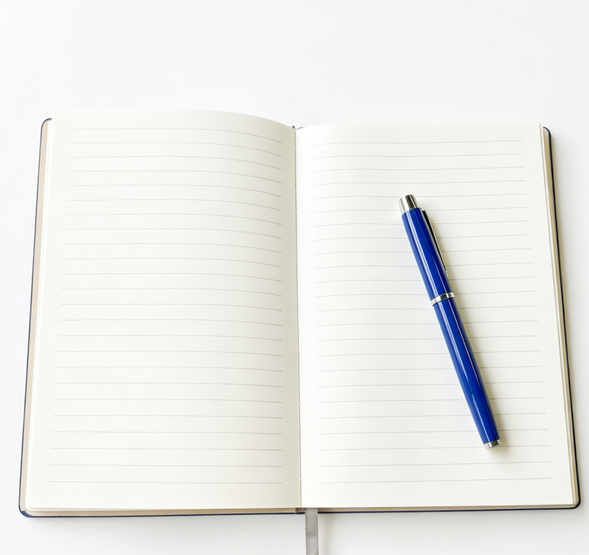Open premium blue leather notebook showing Colorfly custom logo on the cover, matching pen resting