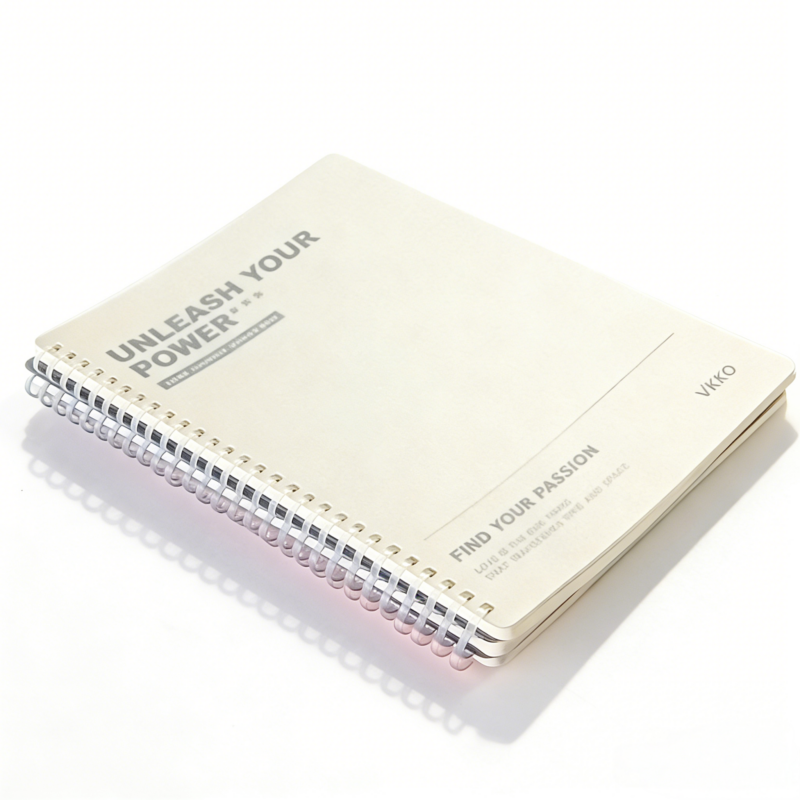 Colorfly custom spiral notebook with soft-touch cover and spiral binding displayed on a wooden desk 