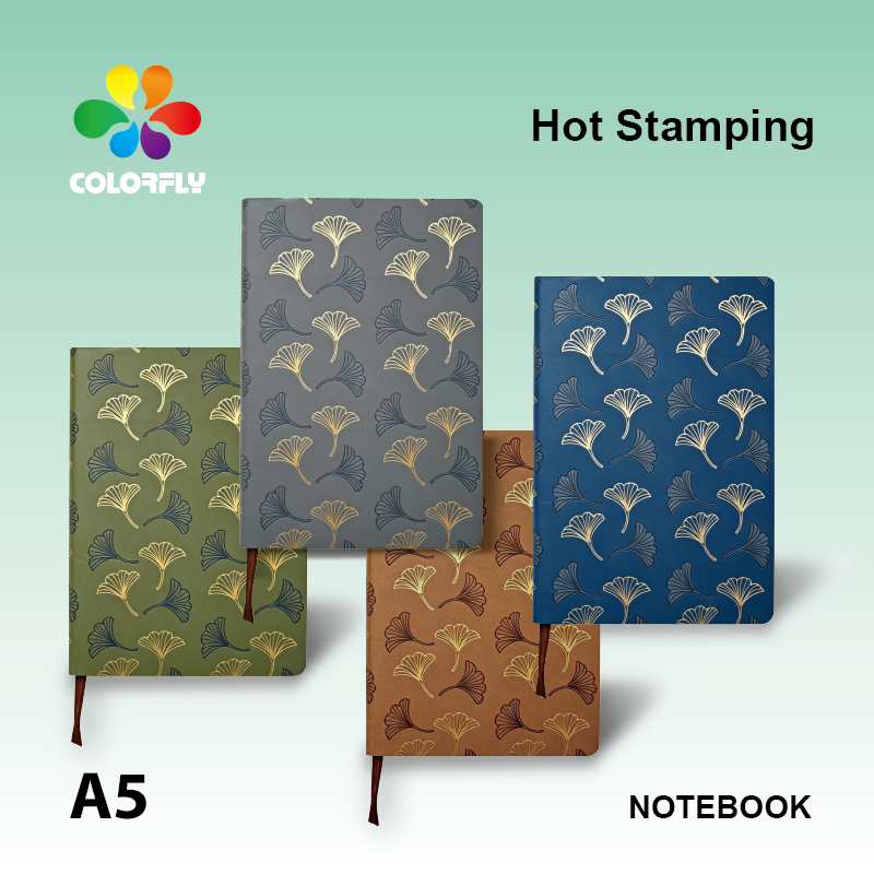 Colorfly A5 Premium Fabric Notebook with ethnic patterns on a wooden desk
